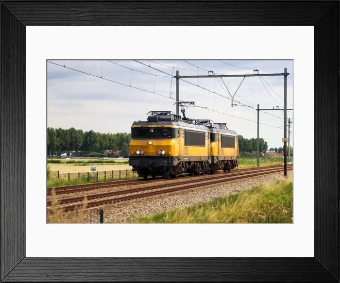 Framed Print : NS Alsthom 1700 locmotives 1750 and 1752 at Railroad track at Moordrecht in the Netherlands Framed Print : NS Alsthom 1700 locmotives 1750 and 1752 at Railroad track at Moordrecht in the Netherlands