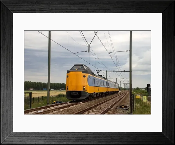Framed Print : Barriers and red lights at railroad crossing in Moordrecht in the Netherlands Framed Print : Barriers and red lights at railroad crossing in Moordrecht in the Netherlands