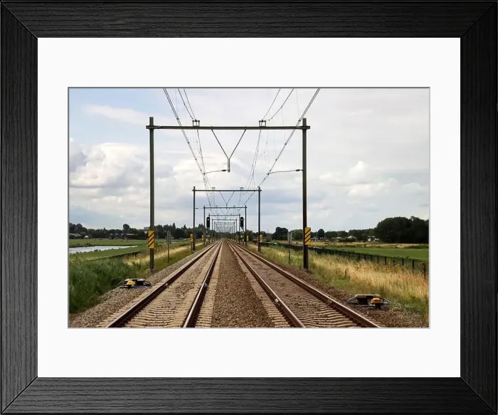 Framed Print : Barriers and red lights at railroad crossing in Moordrecht in the Netherlands Framed Print : Barriers and red lights at railroad crossing in Moordrecht in the Netherlands
