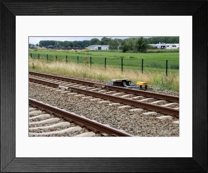 Framed Print : Barriers and red lights at railroad crossing in Moordrecht in the Netherlands Framed Print : Barriers and red lights at railroad crossing in Moordrecht in the Netherlands
