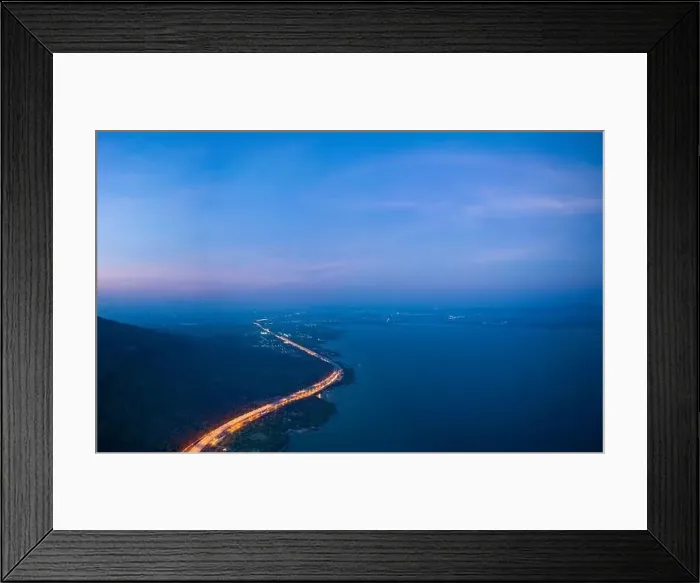 Framed Print : aerial view orange lights on the expressway along the route along the Lam Ta Khong Dam Framed Print : aerial view orange lights on the expressway along the route along the Lam Ta Khong Dam