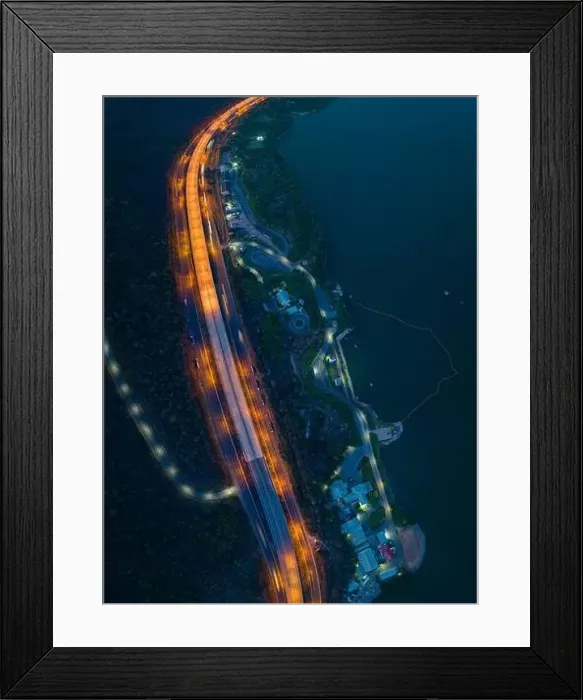 Framed Print : aerial view orange lights on the expressway along the route along the Lam Ta Khong Dam Framed Print : aerial view orange lights on the expressway along the route along the Lam Ta Khong Dam