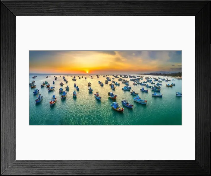 Framed Print : Aerial view of Mui Ne fishing village in sunset sky with hundreds of boats anchored to avoid storms Framed Print : Aerial view of Mui Ne fishing village in sunset sky with hundreds of boats anchored to avoid storms