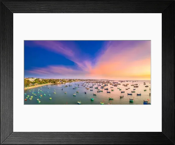 Framed Print : Aerial view of Mui Ne fishing village in sunset sky with hundreds of boats anchored to avoid storms Framed Print : Aerial view of Mui Ne fishing village in sunset sky with hundreds of boats anchored to avoid storms