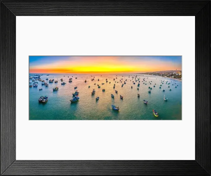 Framed Print : Aerial view of Mui Ne fishing village in sunset sky with hundreds of boats anchored to avoid storms Framed Print : Aerial view of Mui Ne fishing village in sunset sky with hundreds of boats anchored to avoid storms