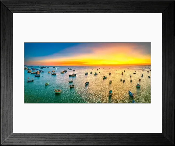 Framed Print : Aerial view of Mui Ne fishing village in sunset sky with hundreds of boats anchored to avoid storms Framed Print : Aerial view of Mui Ne fishing village in sunset sky with hundreds of boats anchored to avoid storms