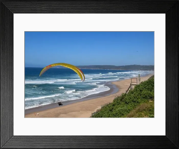Framed Print : Person flying his paraglider on the beach of Wilderness in South Africa Framed Print : Person flying his paraglider on the beach of Wilderness in South Africa