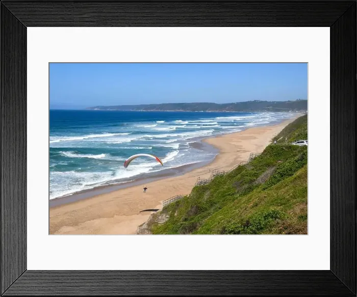 Framed Print : Person flying his paraglider on the beach of Wilderness in South Africa Framed Print : Person flying his paraglider on the beach of Wilderness in South Africa