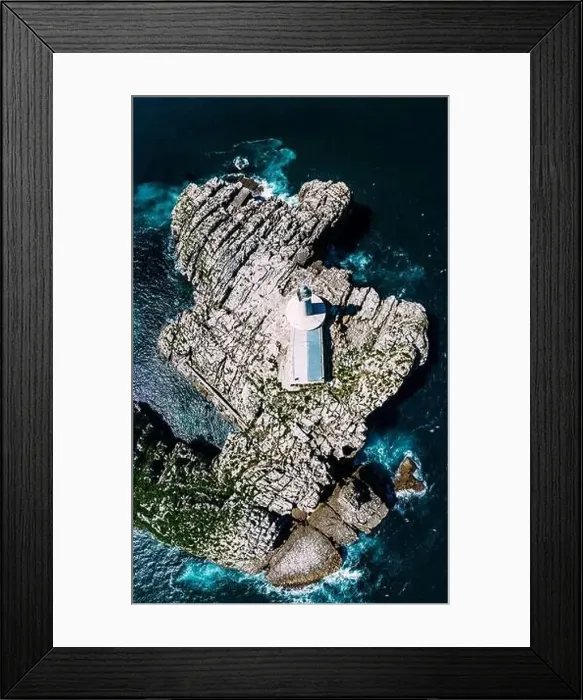Framed Print : Aerial top down view of lighthouse and Island of Mouro at the entrance of the Bay of Santander in Spain Framed Print : Aerial top down view of lighthouse and Island of Mouro at the entrance of the Bay of Santander in Spain