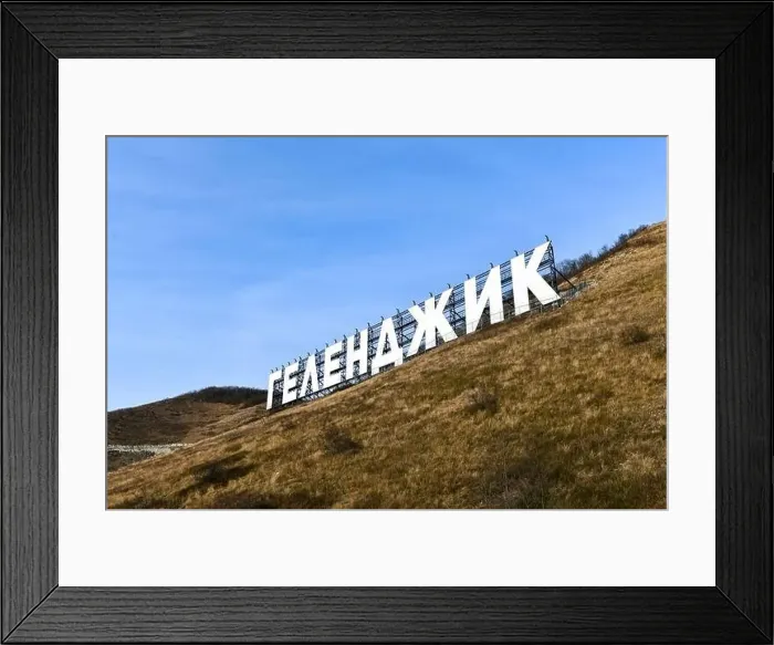 Framed Print : Aerial view of the city of Gelendzhik, Russia and the Black Sea with the sign with the word Gelendzhik in Cyrillic Framed Print : Aerial view of the city of Gelendzhik, Russia and the Black Sea with the sign with the word Gelendzhik in Cyrillic