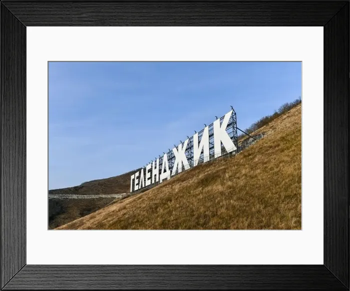 Framed Print : Aerial view of the city of Gelendzhik, Russia and the Black Sea with the sign with the word Gelendzhik in Cyrillic Framed Print : Aerial view of the city of Gelendzhik, Russia and the Black Sea with the sign with the word Gelendzhik in Cyrillic