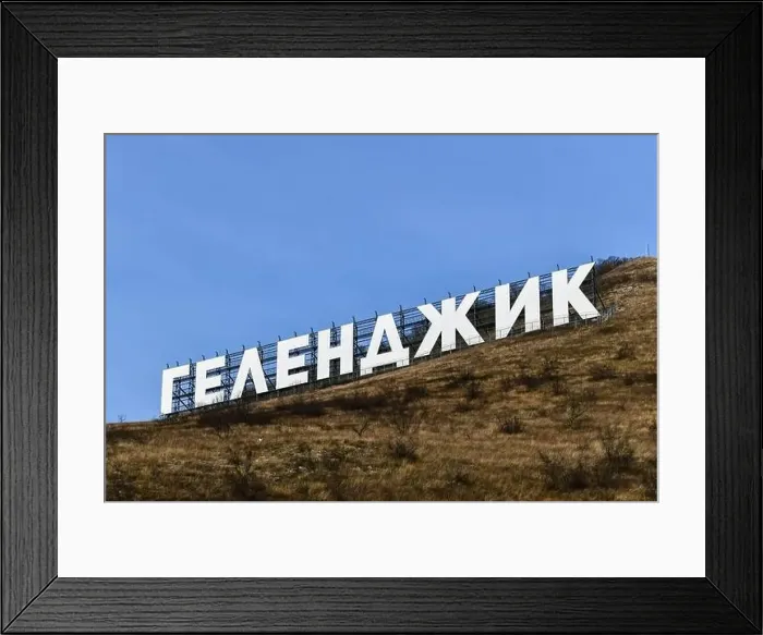 Framed Print : Aerial view of the city of Gelendzhik, Russia and the Black Sea with the sign with the word Gelendzhik in Cyrillic Framed Print : Aerial view of the city of Gelendzhik, Russia and the Black Sea with the sign with the word Gelendzhik in Cyrillic