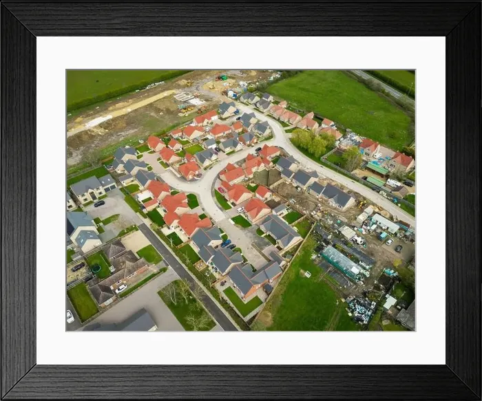 Framed Print : Aerial view of new bungalow hosing development seen in rural Cambridgeshire Framed Print : Aerial view of new bungalow hosing development seen in rural Cambridgeshire