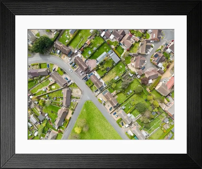 Framed Print : aerial top down view of mostly semi detached houses seen in a typical English village Framed Print : aerial top down view of mostly semi detached houses seen in a typical English village