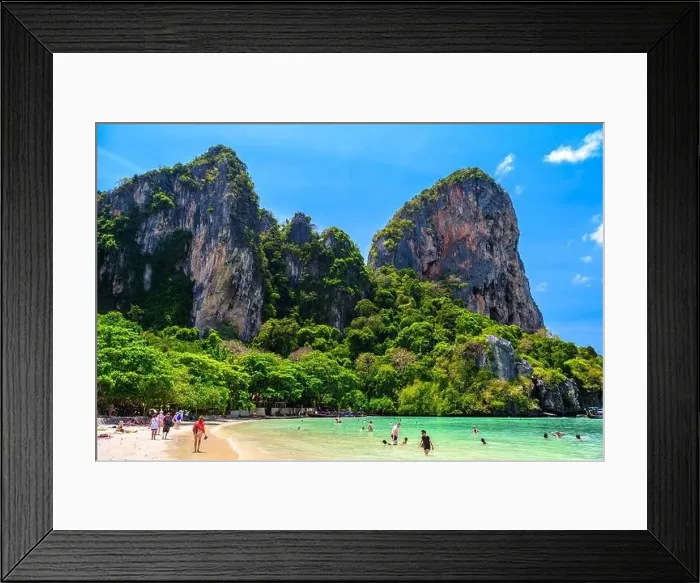 Framed Print : Rocks, water, tropical white sand beach and people swimming in emerald azure water of bay Framed Print : Rocks, water, tropical white sand beach and people swimming in emerald azure water of bay