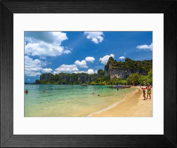 Framed Print : Rocks, water, tropical white sand beach and people swimming in emerald azure water of bay Framed Print : Rocks, water, tropical white sand beach and people swimming in emerald azure water of bay