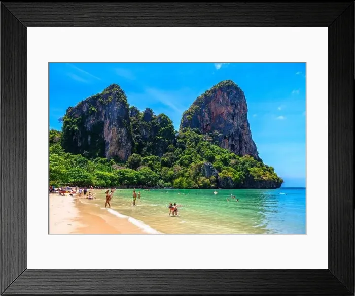Framed Print : Rocks, water, tropical white sand beach and people swimming in emerald azure water of bay Framed Print : Rocks, water, tropical white sand beach and people swimming in emerald azure water of bay