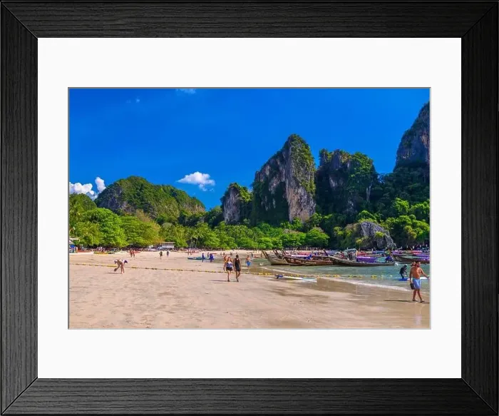 Framed Print : KRABI, THAILAND- MARCH 2018: Rocks, water and tropical white sand beach, Railay beach west, Ao Nang, Krabi, Thailand Framed Print : KRABI, THAILAND- MARCH 2018: Rocks, water and tropical white sand beach, Railay beach west, Ao Nang, Krabi, Thailand