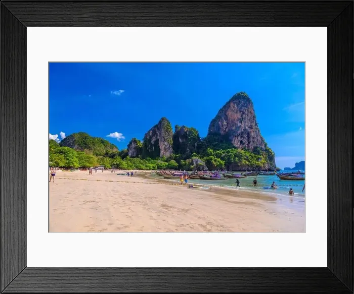 Framed Print : KRABI, THAILAND- MARCH 2018: Rocks, water and tropical white sand beach, Railay beach west, Ao Nang, Krabi, Thailand Framed Print : KRABI, THAILAND- MARCH 2018: Rocks, water and tropical white sand beach, Railay beach west, Ao Nang, Krabi, Thailand