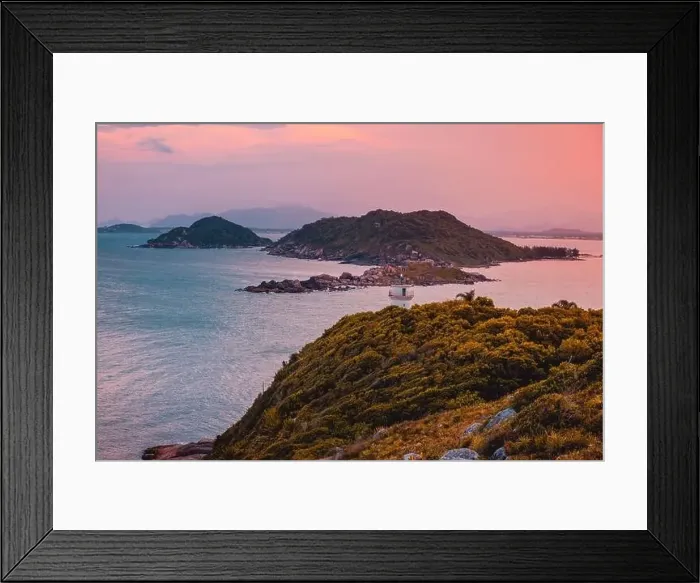 Framed Print : Aerial view of scenic coastline with lighthouse, sunset and ocean in Santa Catarina, Brazil Framed Print : Aerial view of scenic coastline with lighthouse, sunset and ocean in Santa Catarina, Brazil