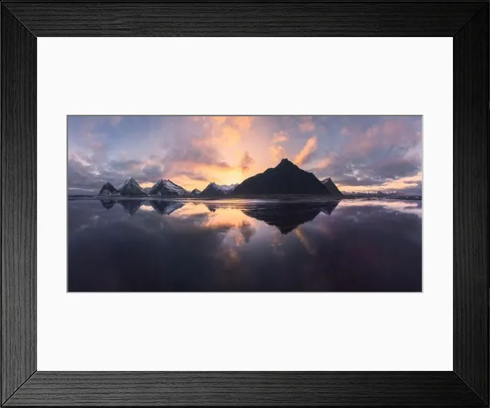Framed Print : Aerial view of snow covered mountains located near sea with reflection in water against bright sky at sundown time in Framed Print : Aerial view of snow covered mountains located near sea with reflection in water against bright sky at sundown time in