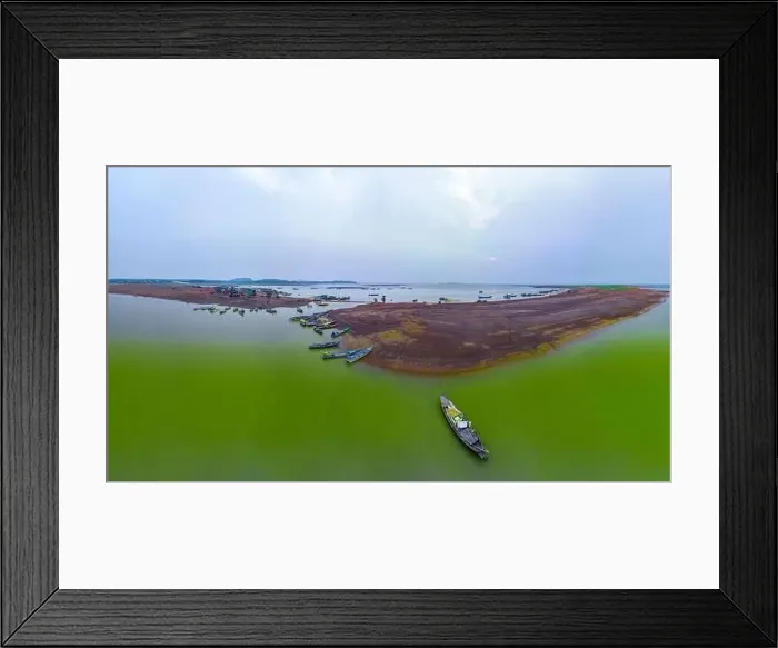 Framed Print : April 16, 2023: panoramic view of Nom wharf in Phu Cuong commune, Dinh Quan district, Dong Nai province at sunset Framed Print : April 16, 2023: panoramic view of Nom wharf in Phu Cuong commune, Dinh Quan district, Dong Nai province at sunset