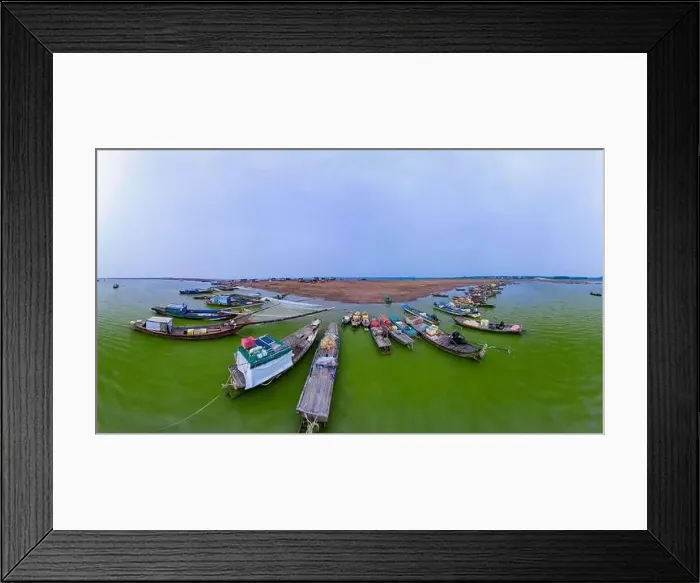 Framed Print : April 16, 2023: panoramic view of Nom wharf in Phu Cuong commune, Dinh Quan district, Dong Nai province at sunset Framed Print : April 16, 2023: panoramic view of Nom wharf in Phu Cuong commune, Dinh Quan district, Dong Nai province at sunset