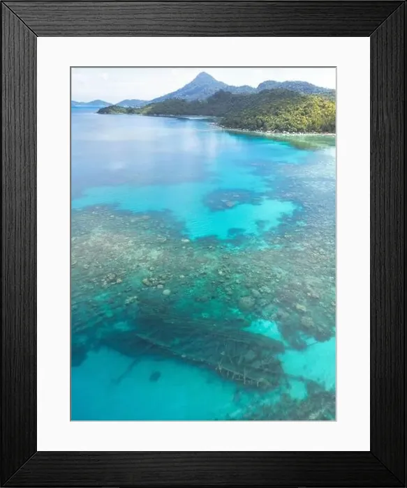 Framed Print : Indonesia Anambas Islands - Drone view Telaga Island coast line with shipwreck Framed Print : Indonesia Anambas Islands - Drone view Telaga Island coast line with shipwreck