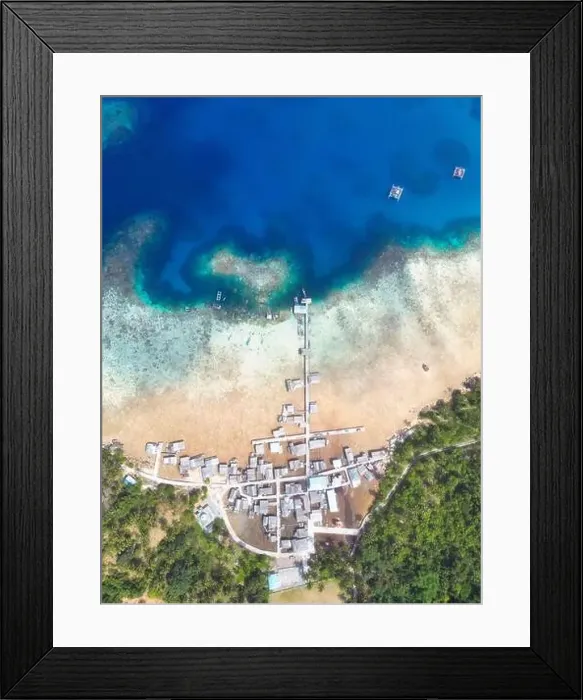 Framed Print : Indonesia Anambas Islands - Drone view Telaga Island coast line with fishing village Framed Print : Indonesia Anambas Islands - Drone view Telaga Island coast line with fishing village
