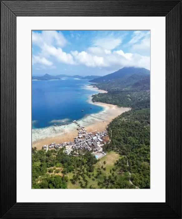 Framed Print : Indonesia Anambas Islands - Drone view Telaga Island coast line with village and vulcano Framed Print : Indonesia Anambas Islands - Drone view Telaga Island coast line with village and vulcano