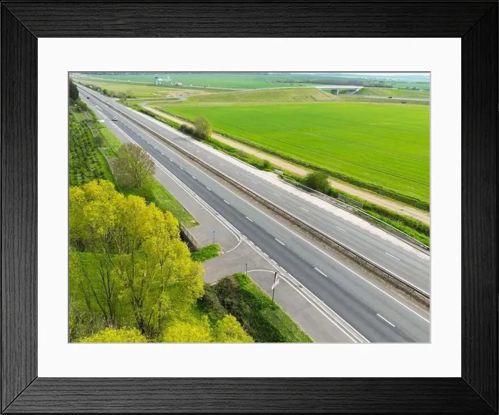 Framed Print : Drone view of part of anEnglish dual carriage way shown in the East Anglian countryside Framed Print : Drone view of part of anEnglish dual carriage way shown in the East Anglian countryside