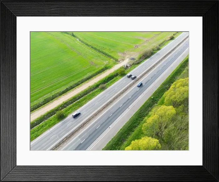 Framed Print : Drone view of part of anEnglish dual carriage way shown in the East Anglian countryside Framed Print : Drone view of part of anEnglish dual carriage way shown in the East Anglian countryside