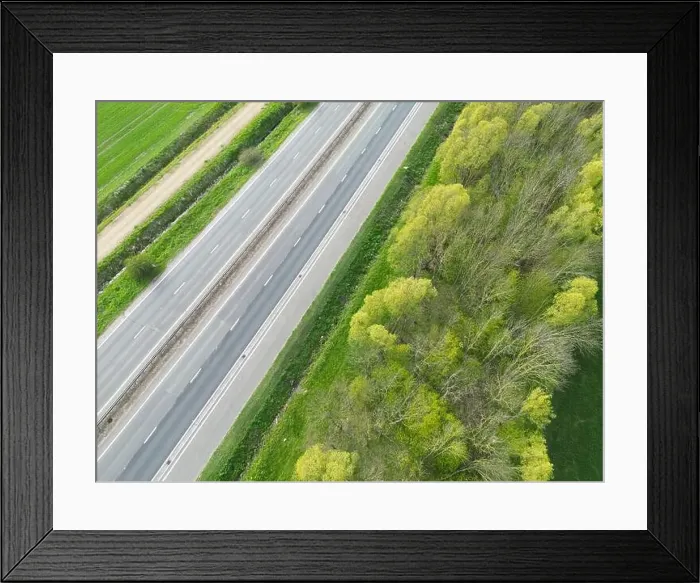 Framed Print : Drone view of part of anEnglish dual carriage way shown in the East Anglian countryside Framed Print : Drone view of part of anEnglish dual carriage way shown in the East Anglian countryside