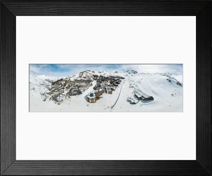 Framed Print : Aerial view of the snowy Val Thorens ski resort in the French Alps in winter - Luxurious hotels secluded in a white Framed Print : Aerial view of the snowy Val Thorens ski resort in the French Alps in winter - Luxurious hotels secluded in a white