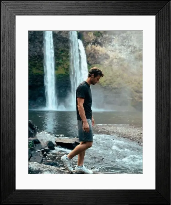 Framed Print : Man standing in front of Wailua Waterfall on Kauai Framed Print : Man standing in front of Wailua Waterfall on Kauai