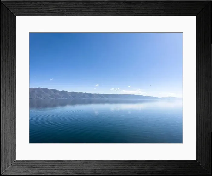Framed Print : Aerial panorama view mountains. Mountain ridge. Stunning mountains range over beautiful blue lake Framed Print : Aerial panorama view mountains. Mountain ridge. Stunning mountains range over beautiful blue lake