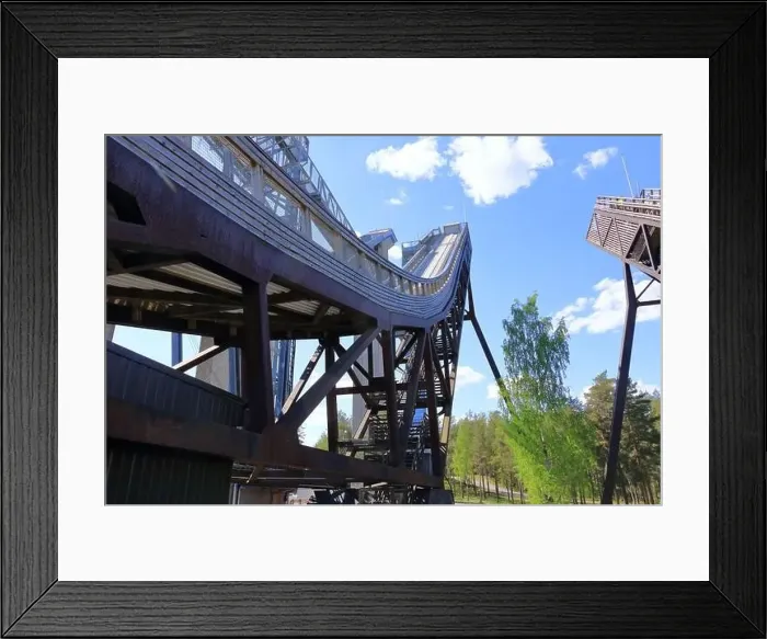 Framed Print : the upper part of the ski jumping facility ski jump towers in summer, Lahti in Finland