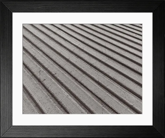 Framed Print : Abstract view from a drone showing the recently ploughed arable field, set into parallel lines Framed Print : Abstract view from a drone showing the recently ploughed arable field, set into parallel lines