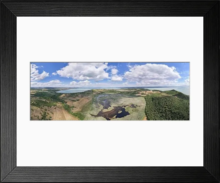 Framed Print : Landscape view of the lake Balaton in Hungary. In the foreground is the Inner lake. Cloudy sky Framed Print : Landscape view of the lake Balaton in Hungary. In the foreground is the Inner lake. Cloudy sky