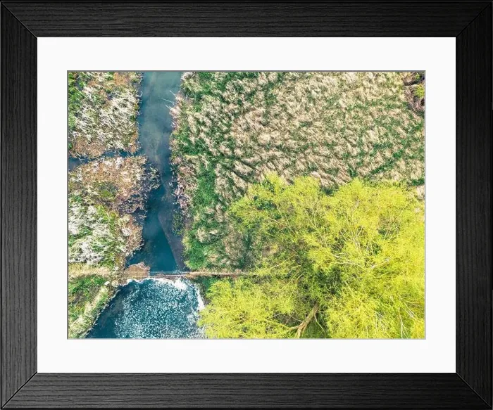 Framed Print : Drone top down view of a very old river crossing now covered with grass. The fresh water river is famous for salmon Framed Print : Drone top down view of a very old river crossing now covered with grass. The fresh water river is famous for salmon