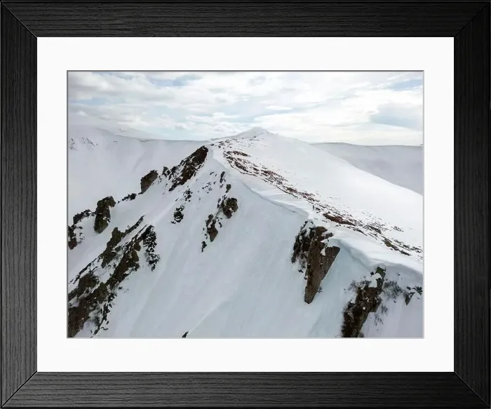 Framed Print : A rocky mountain Shpyci with snow on it and a cloudy sky. Carpathian mountain range Framed Print : A rocky mountain Shpyci with snow on it and a cloudy sky. Carpathian mountain range