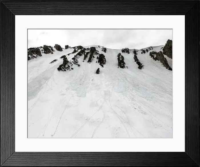 Framed Print : A snowy mountain Shpyci with ski tracks on it and a cloudy sky in the background, Ukrainian Carpathian mountains Framed Print : A snowy mountain Shpyci with ski tracks on it and a cloudy sky in the background, Ukrainian Carpathian mountains