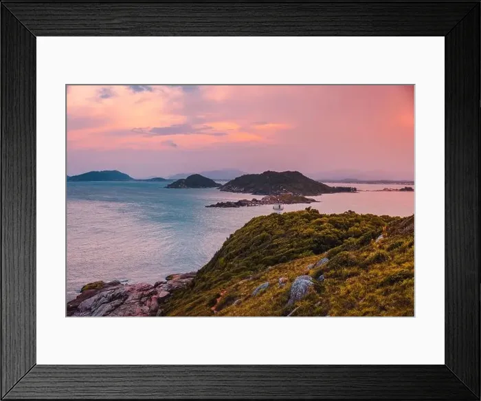 Framed Print : Aerial view of coastline with lighthouse, sunset and ocean in Santa Catarina, Brazil Framed Print : Aerial view of coastline with lighthouse, sunset and ocean in Santa Catarina, Brazil
