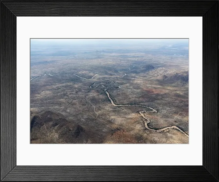 Framed Print : Aerial View of Namibia a winding road through the wilderness Framed Print : Aerial View of Namibia a winding road through the wilderness