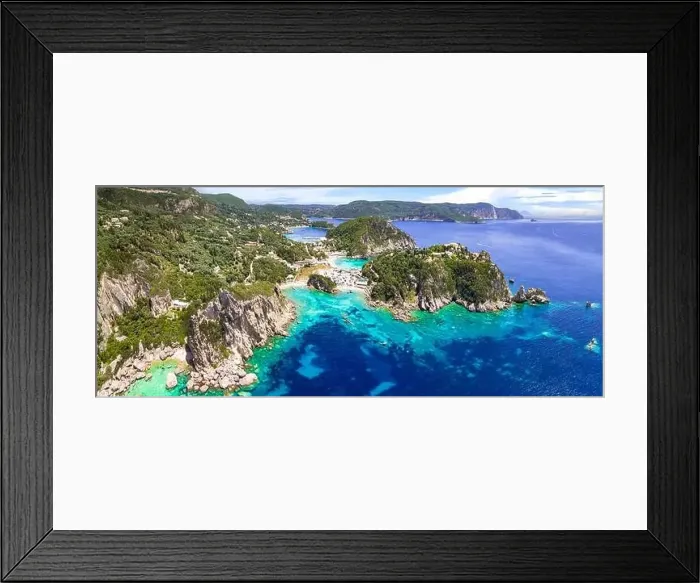 Framed Print : Corfu island. aerial drone view of popular and beautiful Paleokastrtsa tourist village and resort Framed Print : Corfu island. aerial drone view of popular and beautiful Paleokastrtsa tourist village and resort