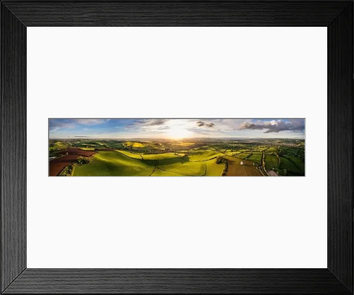 Framed Print : Sunset over Fields and Farmlands in spring from a drone, Devon, England, Europe Framed Print : Sunset over Fields and Farmlands in spring from a drone, Devon, England, Europe