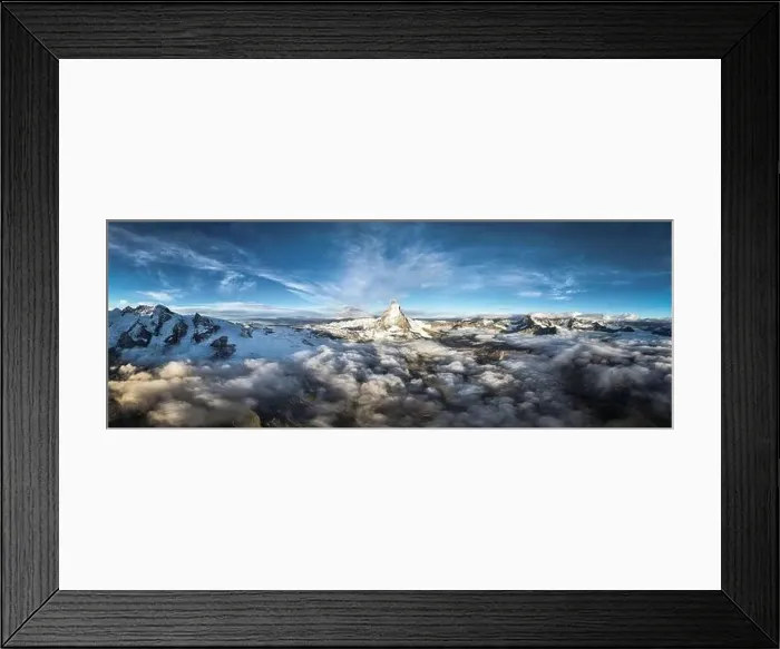 Framed Print : Aerial view of Matterhorn mountain peak in a sea of clouds at dawn, Zermatt, canton of Valais, Switzerland, Europe Framed Print : Aerial view of Matterhorn mountain peak in a sea of clouds at dawn, Zermatt, canton of Valais, Switzerland, Europe