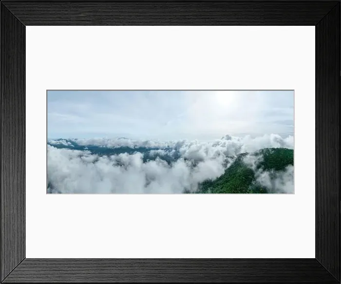 Framed Print : Aerial view Panorama of flowing fog waves on mountain tropical rainforest Framed Print : Aerial view Panorama of flowing fog waves on mountain tropical rainforest