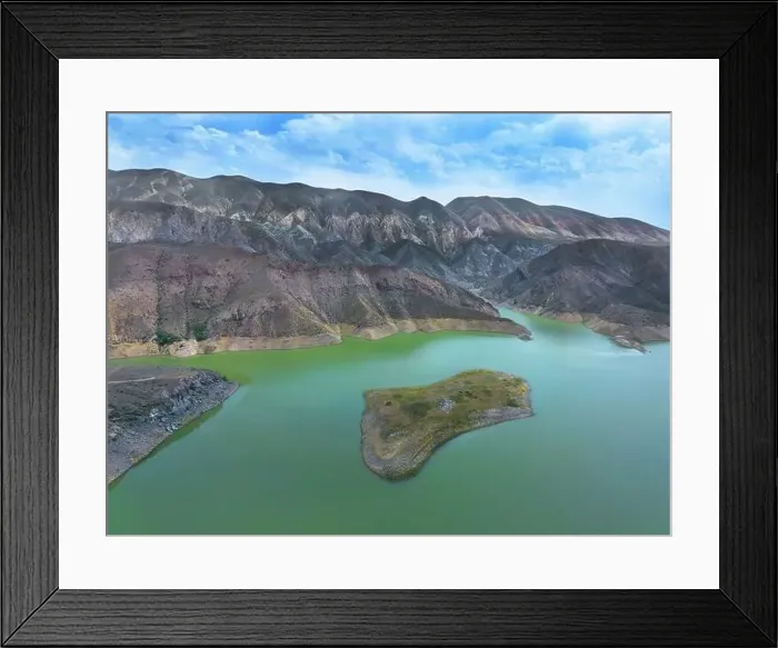 Framed Print : Aerial view on mountain lake. Drone over water reservoir at mountain valley Framed Print : Aerial view on mountain lake. Drone over water reservoir at mountain valley
