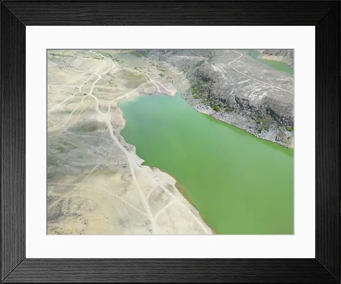 Framed Print : Aerial view on mountain lake. Drone over water reservoir at mountain valley Framed Print : Aerial view on mountain lake. Drone over water reservoir at mountain valley
